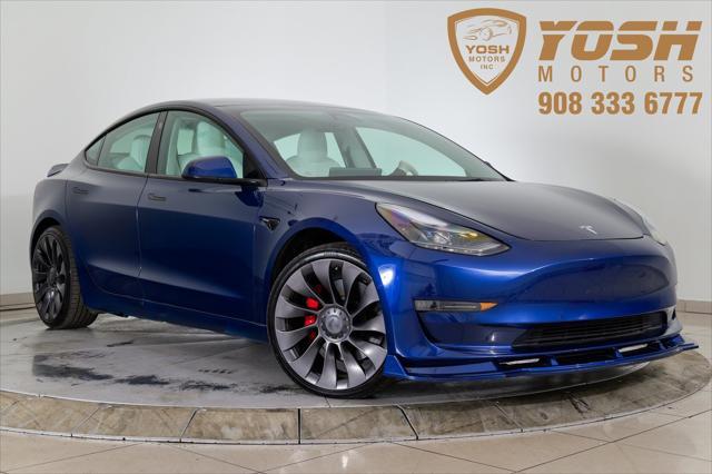 used 2022 Tesla Model 3 car, priced at $27,786