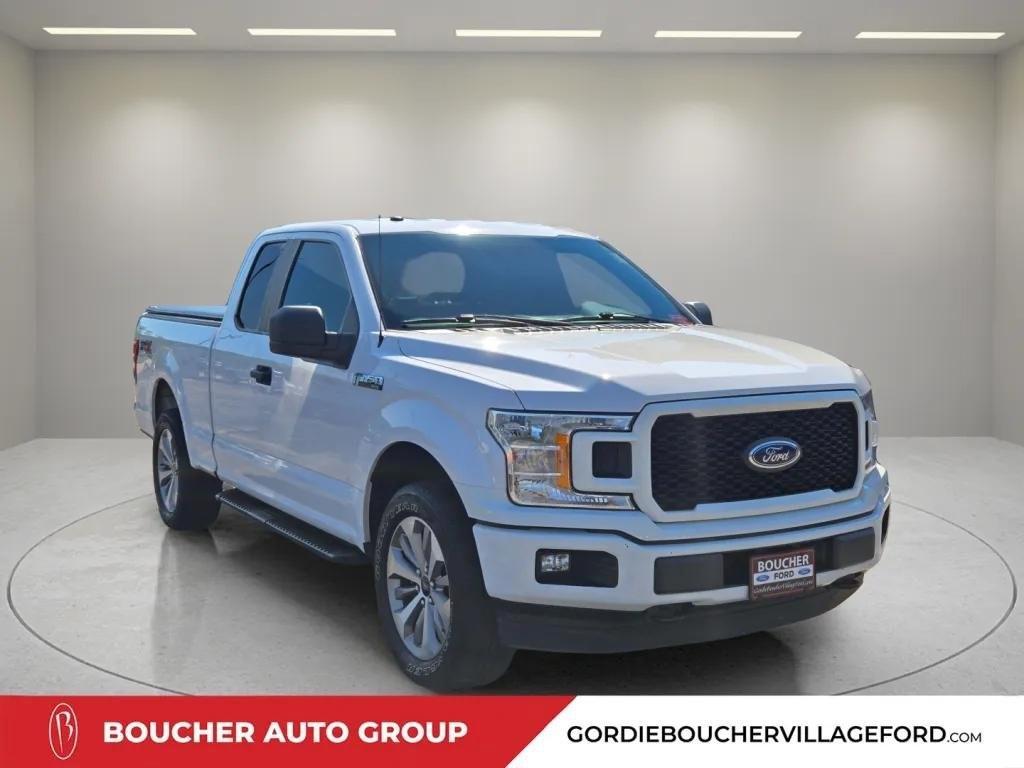 used 2018 Ford F-150 car, priced at $18,400