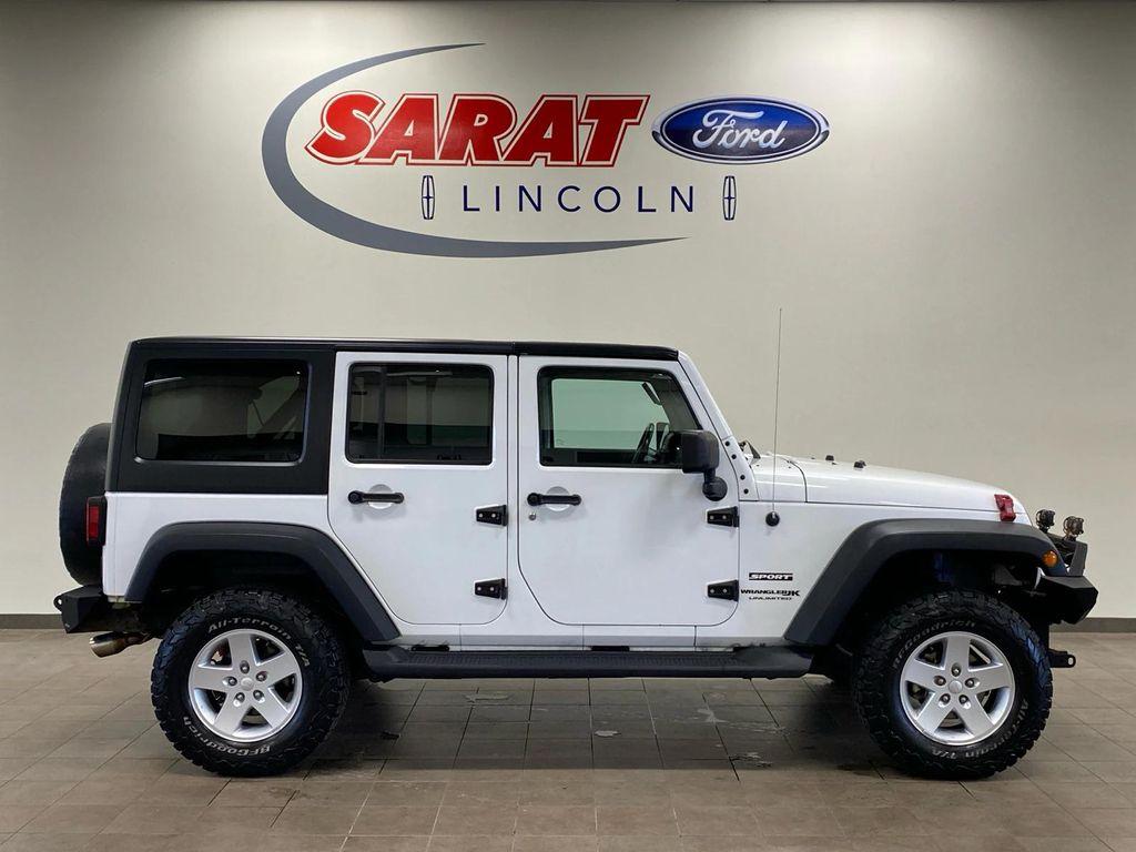 used 2018 Jeep Wrangler JK Unlimited car, priced at $22,685