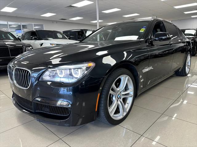 used 2015 BMW 740 car, priced at $13,499