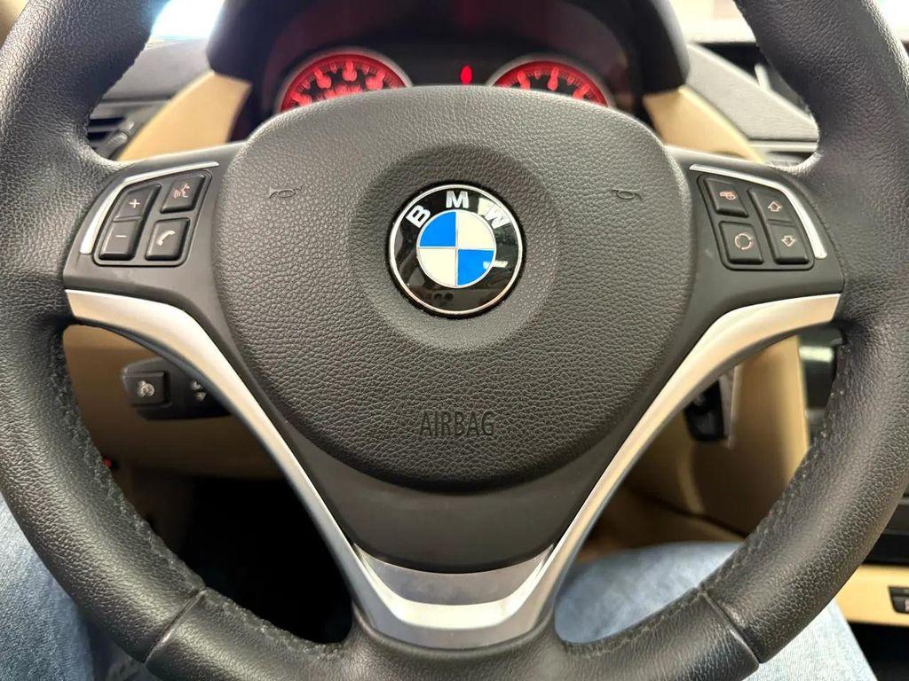 used 2014 BMW X1 car, priced at $11,299