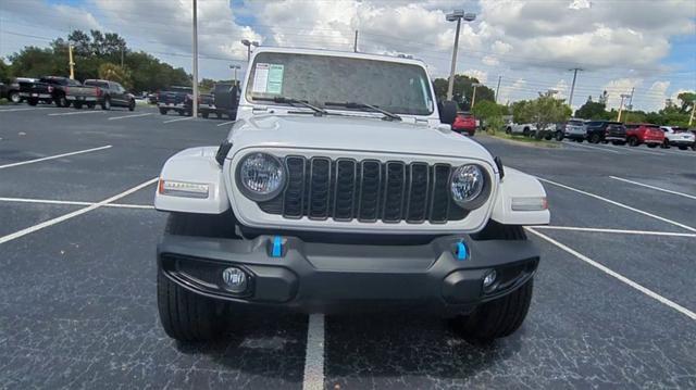 used 2024 Jeep Wrangler 4xe car, priced at $40,340