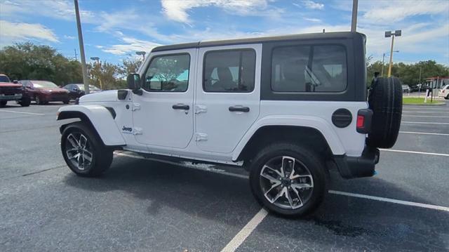 used 2024 Jeep Wrangler 4xe car, priced at $40,340