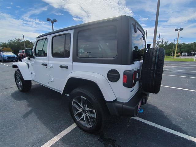 used 2024 Jeep Wrangler 4xe car, priced at $40,340