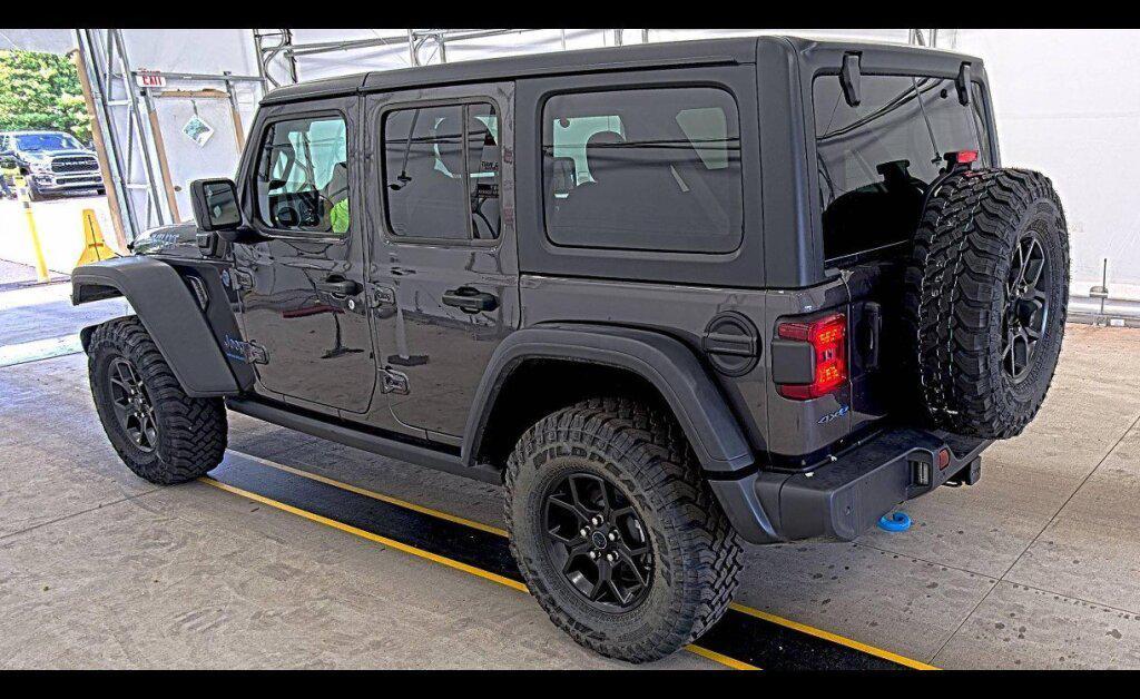 used 2024 Jeep Wrangler 4xe car, priced at $36,996