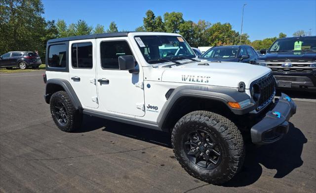 used 2024 Jeep Wrangler 4xe car, priced at $36,996