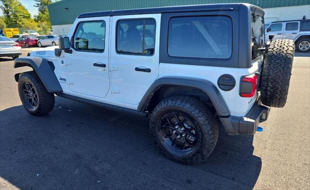 used 2024 Jeep Wrangler 4xe car, priced at $36,996