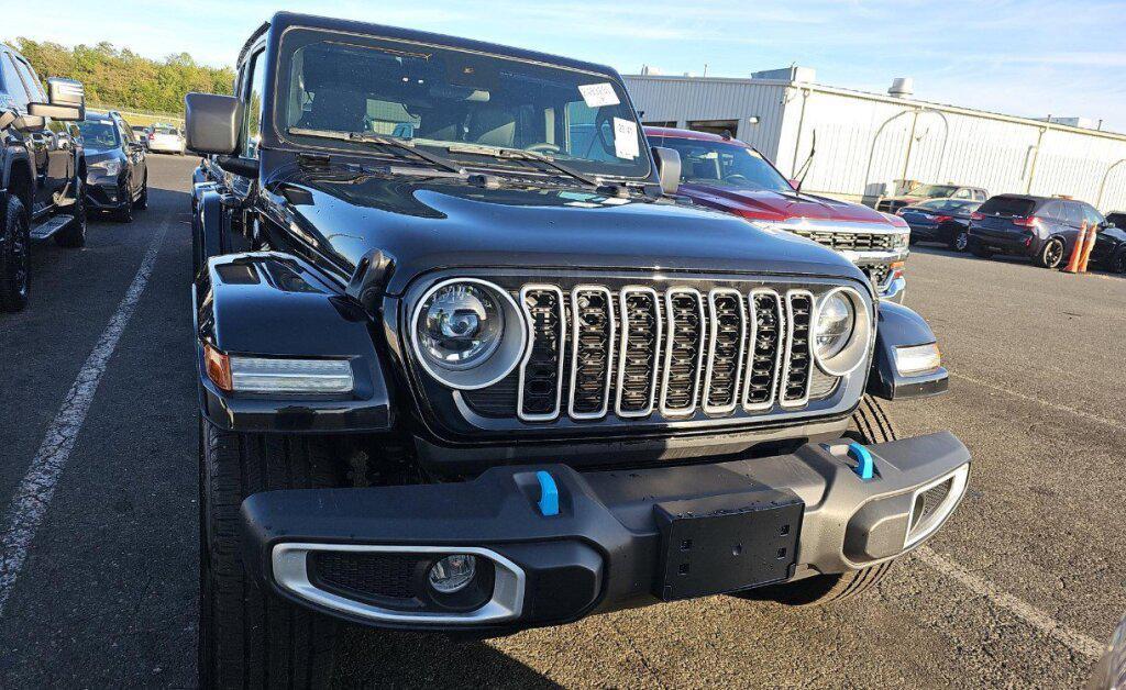 used 2024 Jeep Wrangler 4xe car, priced at $36,996