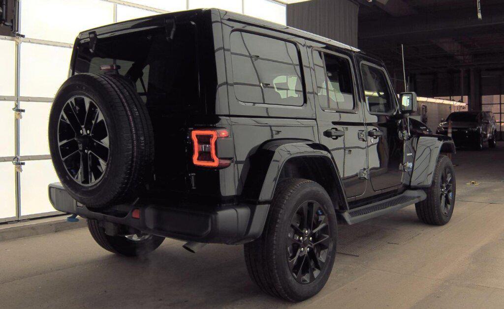 used 2023 Jeep Wrangler 4xe car, priced at $33,996