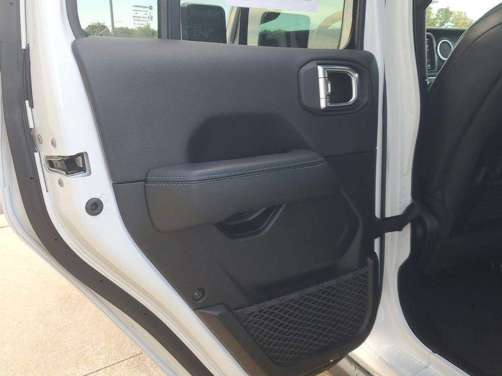 used 2023 Jeep Wrangler 4xe car, priced at $36,996