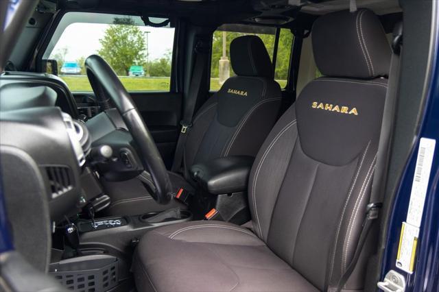 used 2013 Jeep Wrangler Unlimited car, priced at $16,700