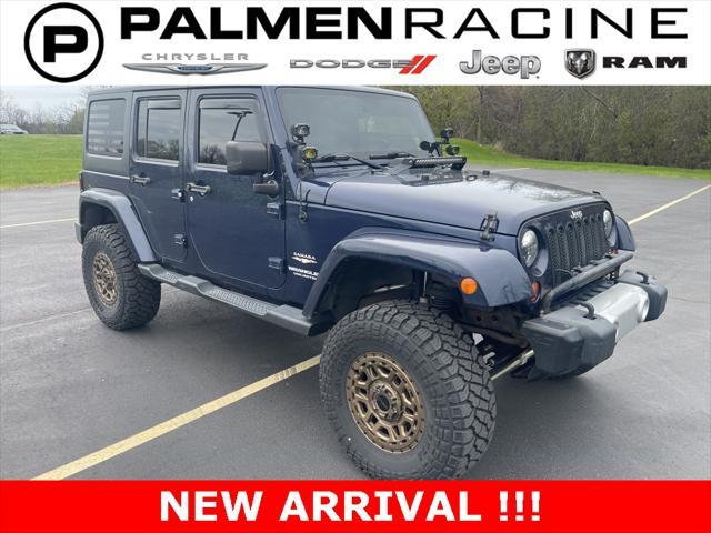 used 2013 Jeep Wrangler Unlimited car, priced at $17,946
