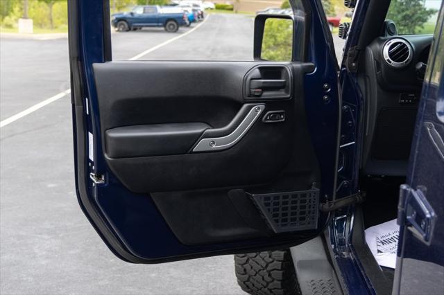 used 2013 Jeep Wrangler Unlimited car, priced at $16,700