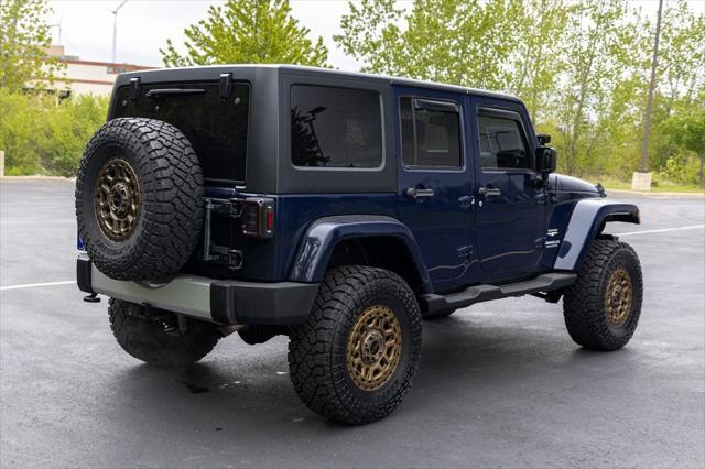 used 2013 Jeep Wrangler Unlimited car, priced at $16,700