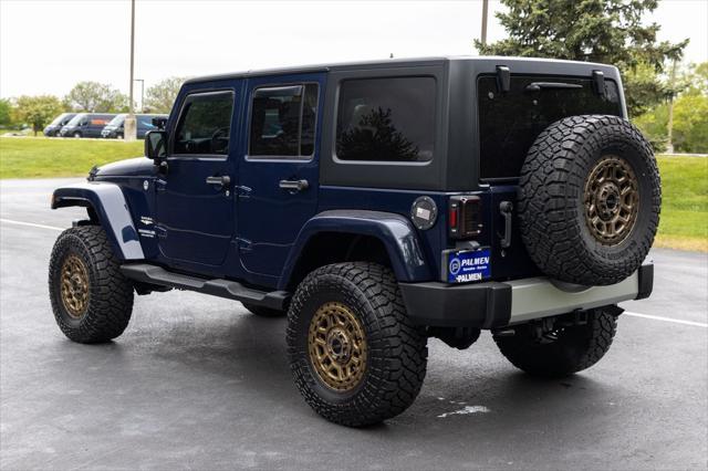 used 2013 Jeep Wrangler Unlimited car, priced at $16,700