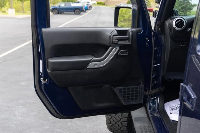 used 2013 Jeep Wrangler Unlimited car, priced at $16,250
