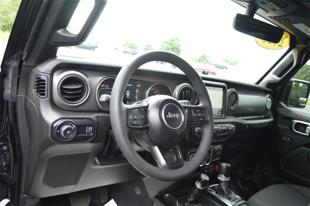 used 2023 Jeep Wrangler car, priced at $34,641