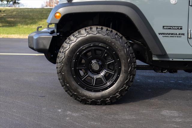 used 2014 Jeep Wrangler Unlimited car, priced at $15,996