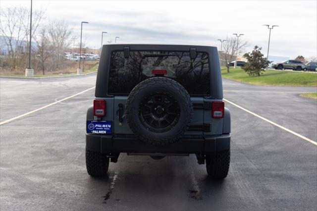 used 2014 Jeep Wrangler Unlimited car, priced at $15,996