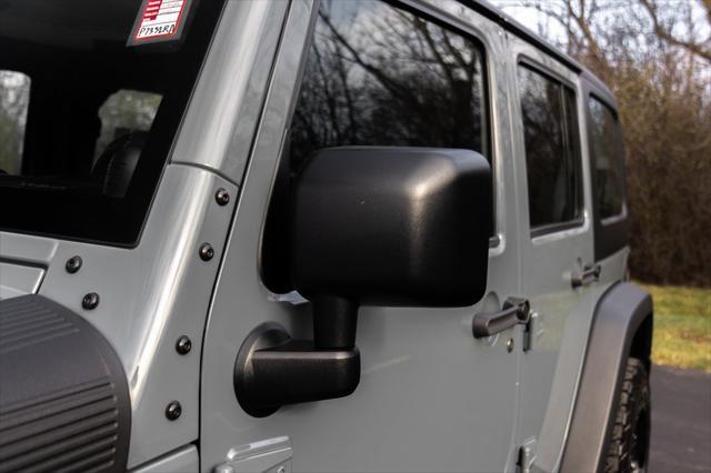 used 2014 Jeep Wrangler Unlimited car, priced at $15,996