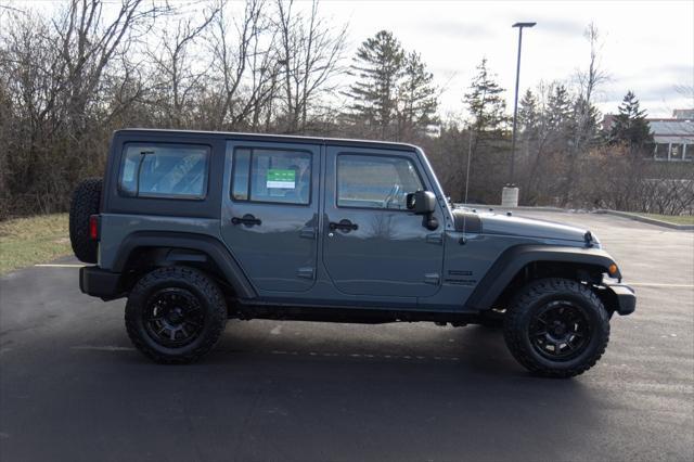 used 2014 Jeep Wrangler Unlimited car, priced at $15,996