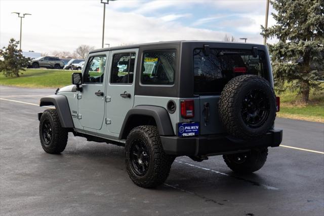 used 2014 Jeep Wrangler Unlimited car, priced at $15,996