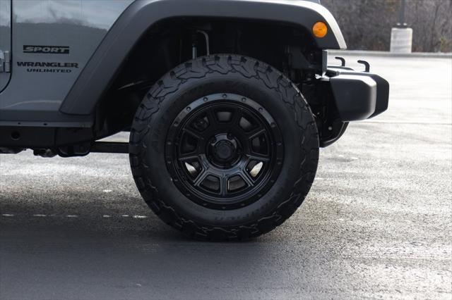 used 2014 Jeep Wrangler Unlimited car, priced at $15,996