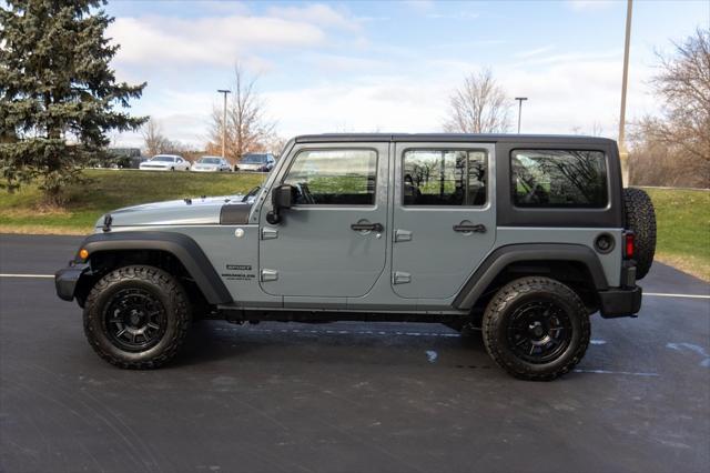 used 2014 Jeep Wrangler Unlimited car, priced at $15,996