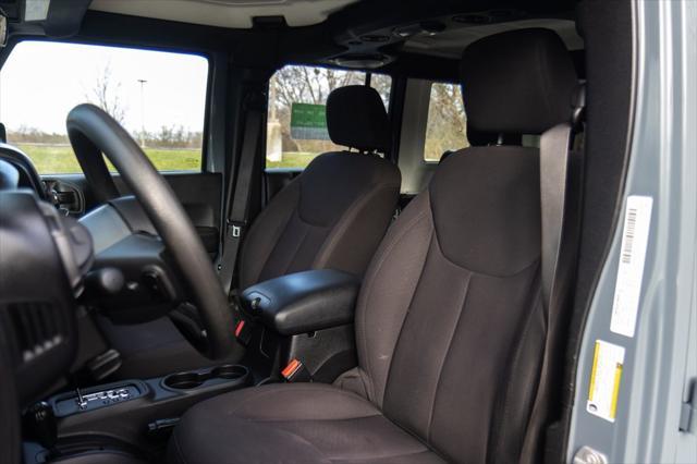 used 2014 Jeep Wrangler Unlimited car, priced at $15,996