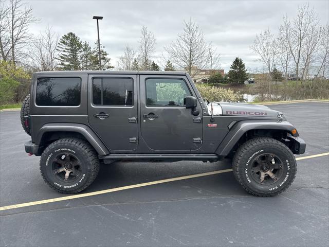 used 2016 Jeep Wrangler Unlimited car, priced at $25,990