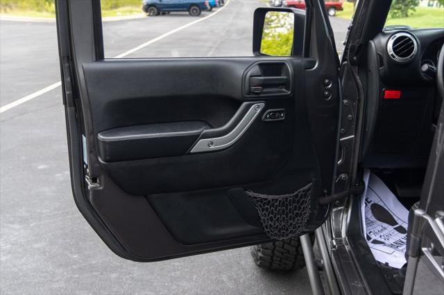 used 2016 Jeep Wrangler Unlimited car, priced at $23,996