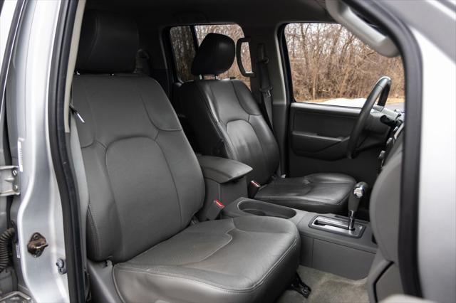 used 2013 Nissan Frontier car, priced at $14,500