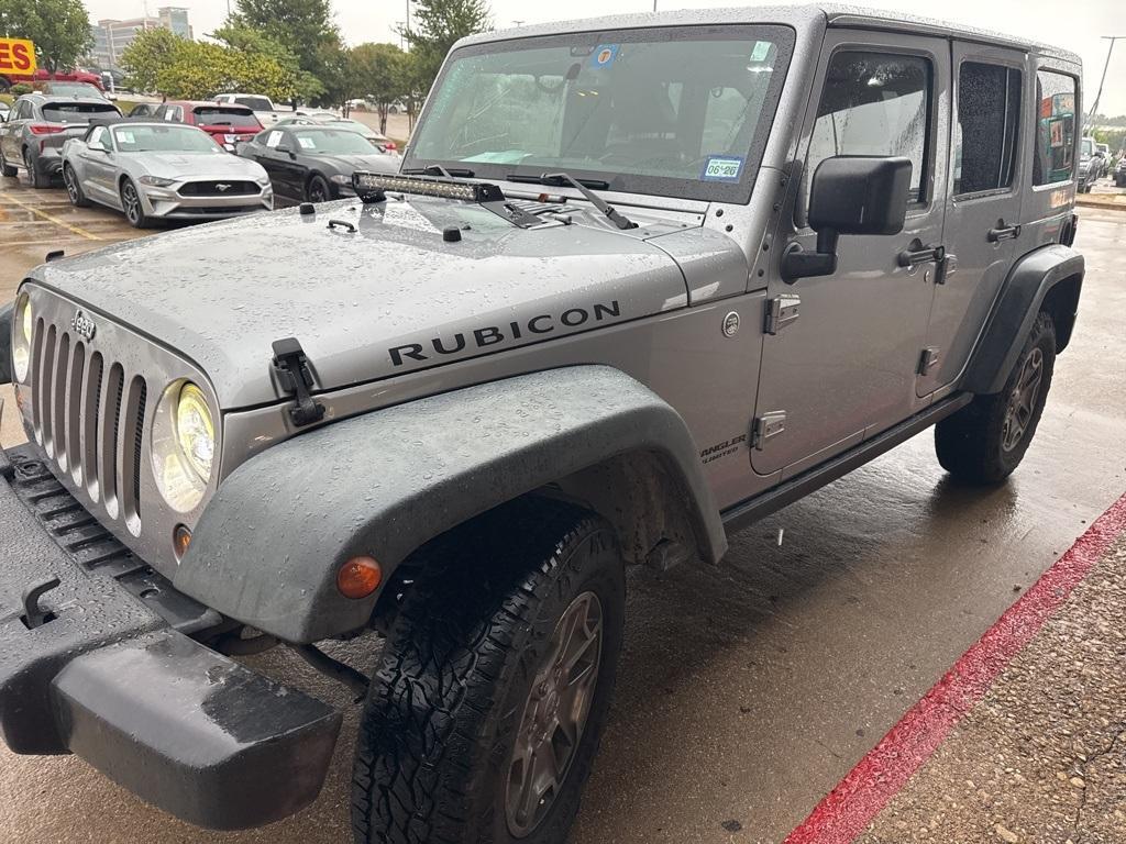 used 2014 Jeep Wrangler Unlimited car, priced at $14,047