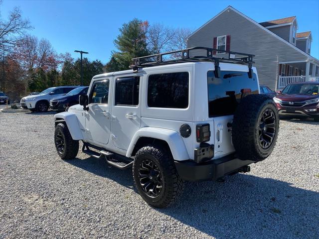 used 2015 Jeep Wrangler Unlimited car, priced at $22,988