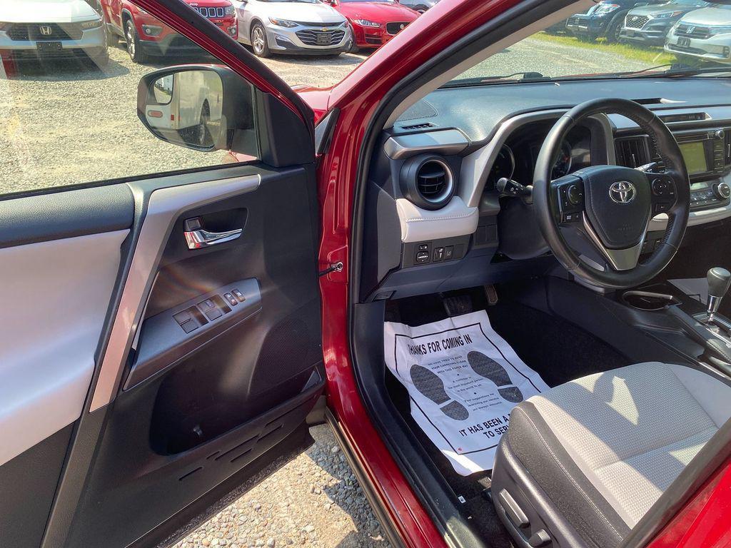 used 2018 Toyota RAV4 Hybrid car, priced at $17,999
