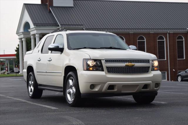 used 2013 Chevrolet Avalanche car, priced at $13,990