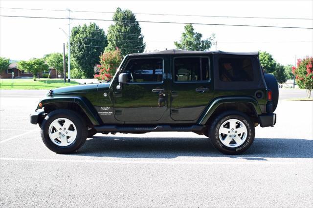 used 2011 Jeep Wrangler Unlimited car, priced at $15,490