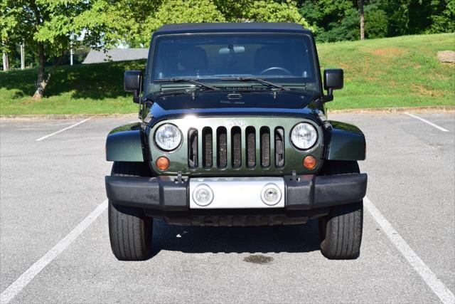 used 2011 Jeep Wrangler Unlimited car, priced at $15,490