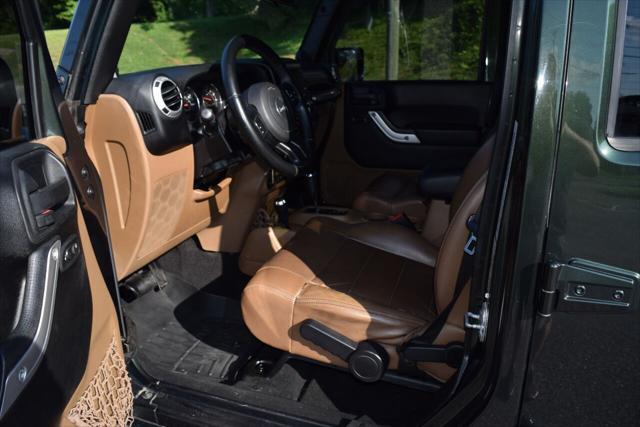 used 2011 Jeep Wrangler Unlimited car, priced at $15,490