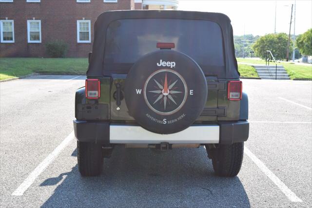 used 2011 Jeep Wrangler Unlimited car, priced at $15,490