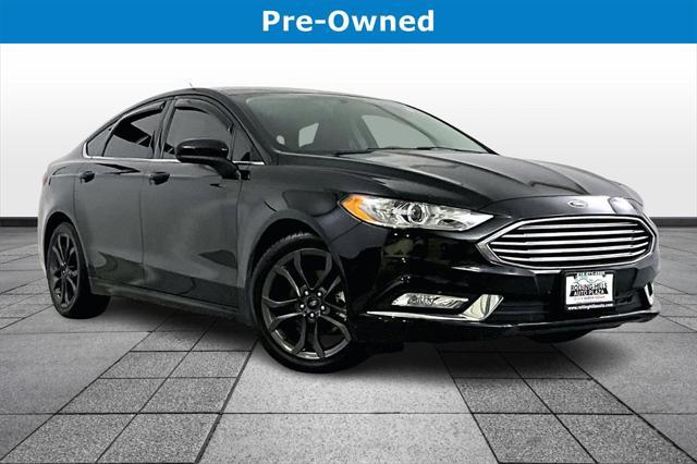 used 2018 Ford Fusion car, priced at $13,981