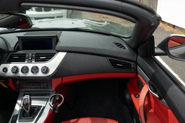used 2013 BMW Z4 car, priced at $19,995