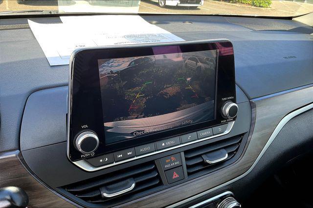 used 2023 Nissan Altima car, priced at $15,500