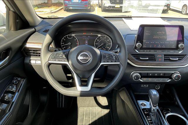 used 2023 Nissan Altima car, priced at $15,500