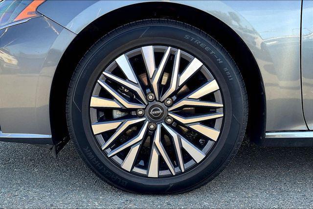 used 2023 Nissan Altima car, priced at $15,000