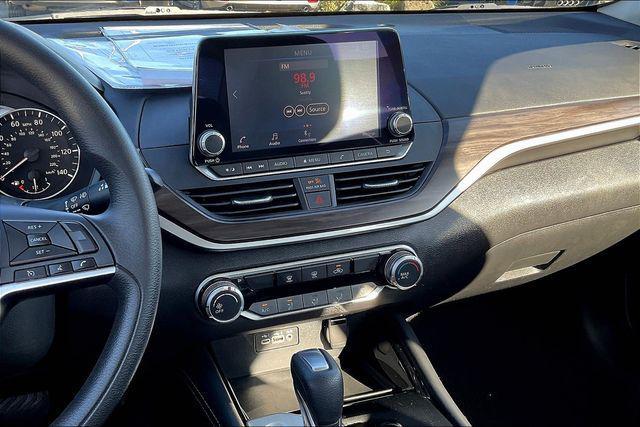 used 2023 Nissan Altima car, priced at $15,000