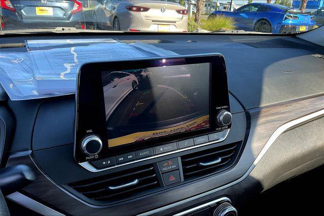 used 2023 Nissan Altima car, priced at $15,000