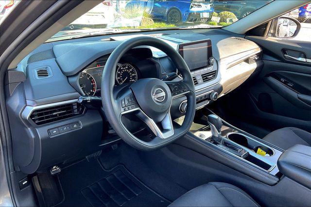 used 2023 Nissan Altima car, priced at $15,000