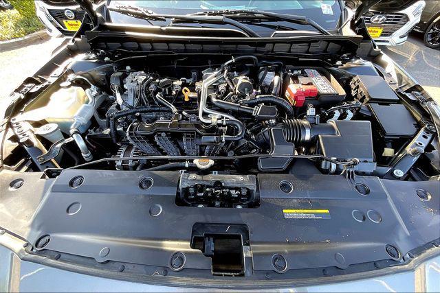 used 2023 Nissan Altima car, priced at $15,000