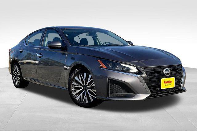 used 2023 Nissan Altima car, priced at $15,000